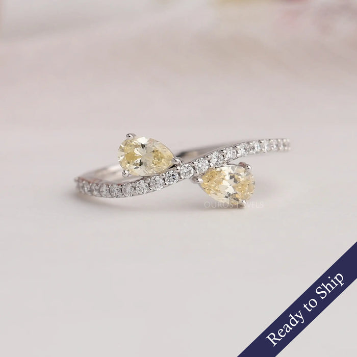 Yellow Pear Shaped Lab Grown Diamond Engagement Ring With Round Accent Stones