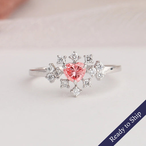 Pink heart cur lab grown diamond engagement ring with cluster of round diamonds in 14k white gold
