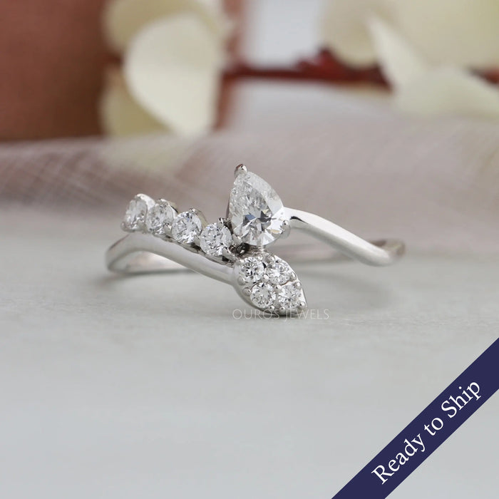 Pear shaped lab grown diamond curved shank engagement ring in 14k white gold