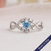 Blue heart infinity shaped lab grown diamond ring with exquisite halo of round diamonds