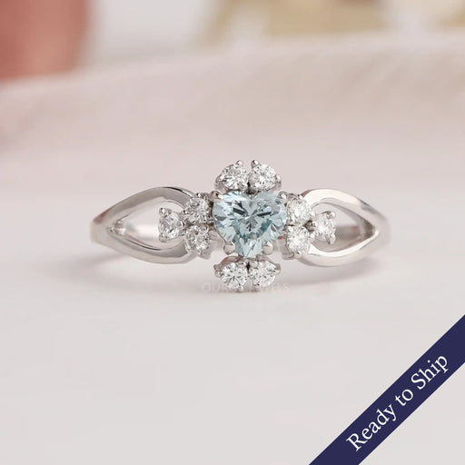 Front view of Bluish Green heart shaped diamond ring in 14k white gold & VS clarity.
