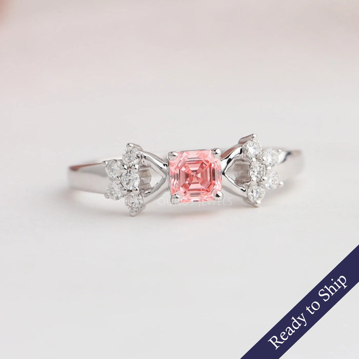 Pink asscher cut lab grown diamond engagement ring with cluster of round cut diamonds crafted in solid white gold
