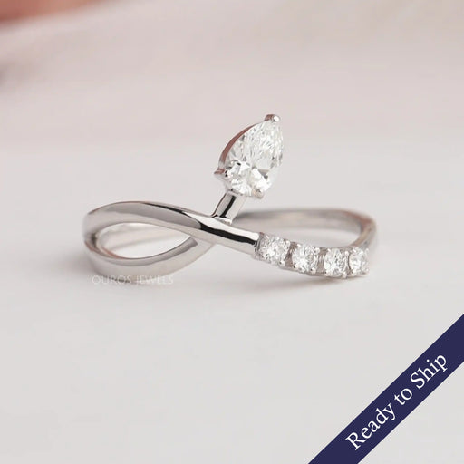 Express your feelings with pear cut infinity dainty ring, this ring made in 14k white gold.