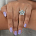 Shimmering flower shaped lab created diamond engagement ring 