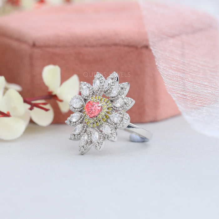 side view of pink and yellow lab diamond cluster engagement ring made in white gold
