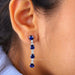 [A Women wearing Blue Sapphire Cushion Lab Diamond Earrings]-[Ouros Jewels]
