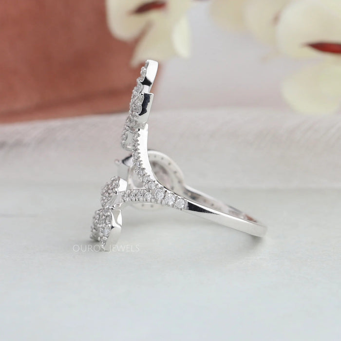 Side view of pear shaped vintage engagement ring set in split shank.