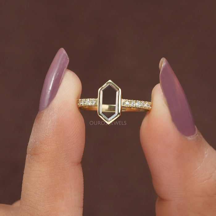 [a women holding long hexagone potrait cut ring]-[Ouros Jewels]