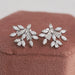 A stunning pair of vintage lab diamond earrings made with marquise, pear and round diamonds