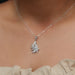 On neck look of Leaf shaped lab created diamond pendant in solid gold