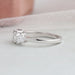 Side look of four stone diamond dainty ring 