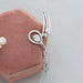 Conflict Free CVD Diamond Teardrop Bangle on pink jewelry box