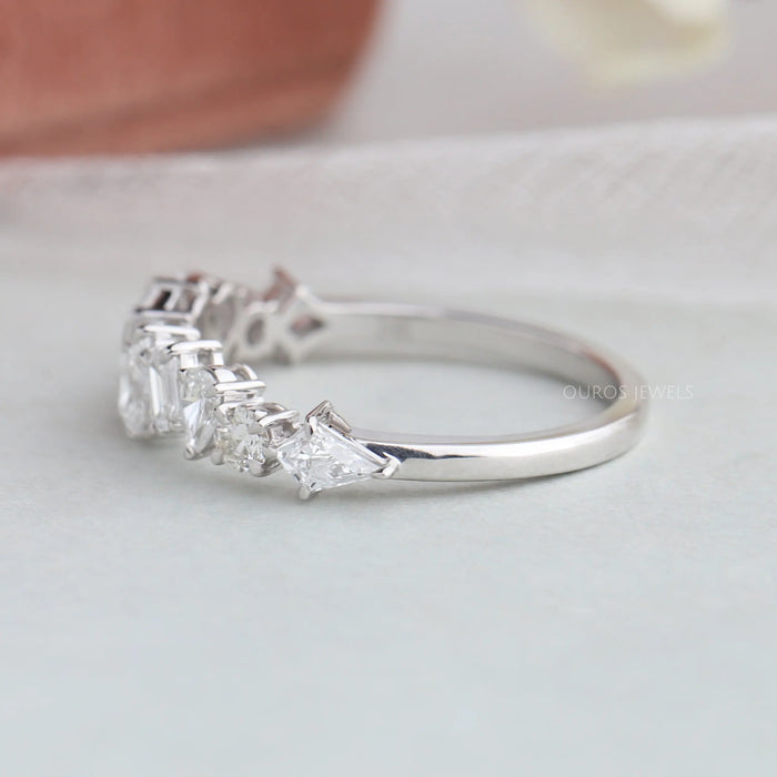 Crafted with solid white gold, this multi shape diamond band