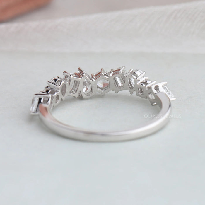 Stunning diamond ring features multi-shape diamonds of elegantly set to create a gorgeous diamond band