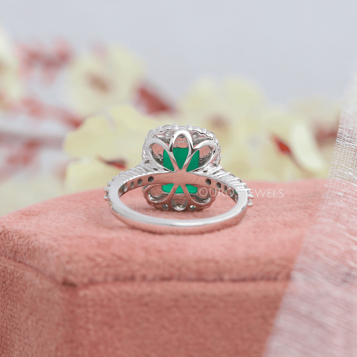 Natural Green Gemstone Emerald Cut Halo Engagement Ring. Crafted with 3 carats of stunning green gemstones, set in white gold, this ring is the epitome of elegance and sophistication