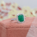 Natural green gemstone emerald cut halo engagement ring! With a whopping 3 carat emerald cut gemstone