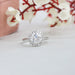 Old european round cut lab grown diamond engagement ring surrounded by sparkling halo setting