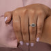 In finger look of Round and Asscher cut lab created diamond engagement ring 