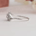 Side view of white gold lab diamond engagement ring crafted with Oval cut diamond