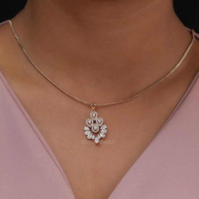 Shining pear shape lab made diamond pendant with a exquisite halo of round diamonds set in rose gold 