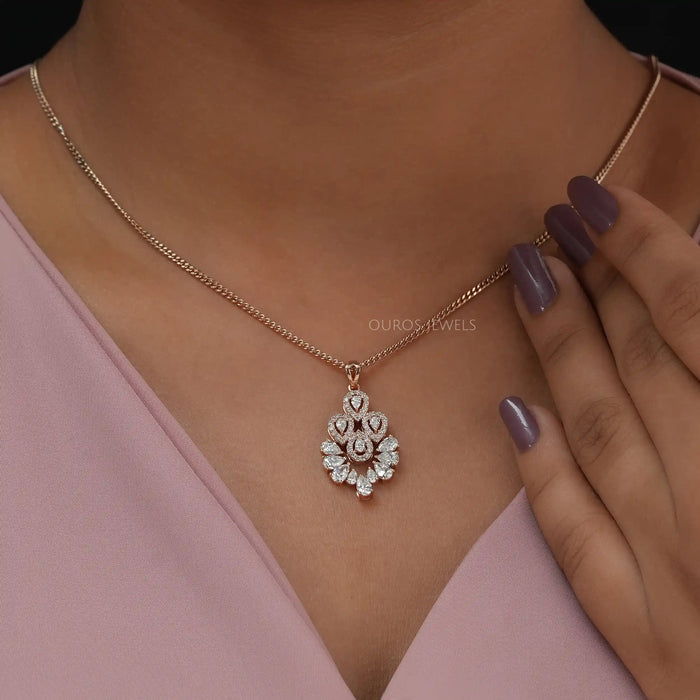 Lovely pear shaped diamond necklace with 14k sold rose gold chain around neck