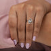In finger look of pear shaped lab created diamond cluster engagement ring