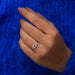 In finger look of pink cushion shaped lab created diamond halo engagement ring
