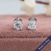 Cushion brilliant cut lab grown diamond solitaire stud earrings in 14k white gold secured with claw prongs