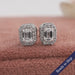 Front view of Emerald Cut stud earring crafted with halo style setting with 4 prong set.