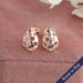 Front view of pear shaped stud earrings in rose gold. Crafted with VS clarity.