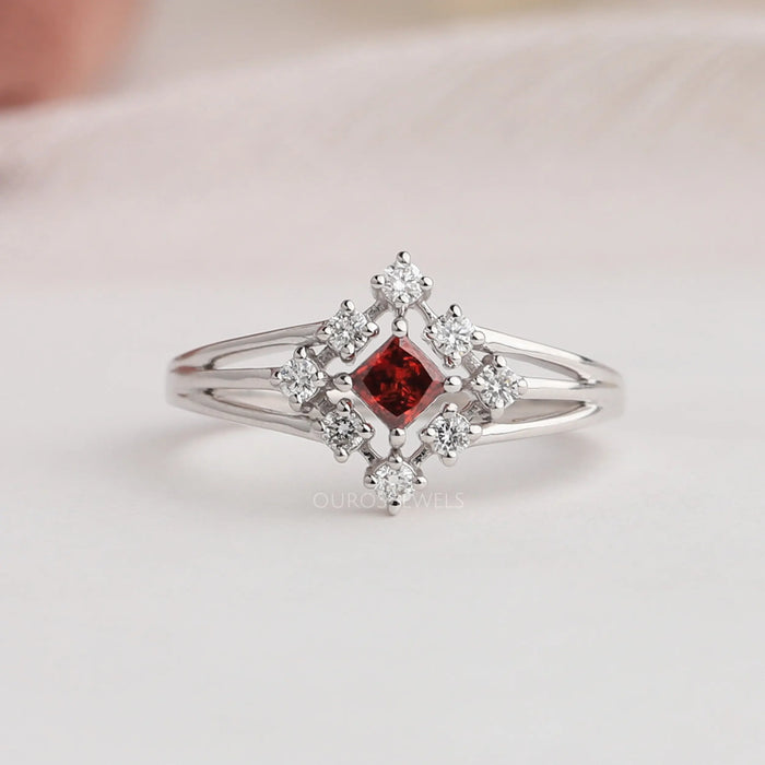 Fancy red princess colored diamond engagement ring with multi row split shank and traditional prongs 