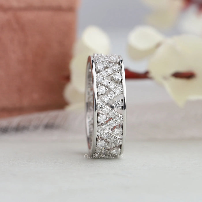Crown style pattern created with round cluster diamonds in lab created diamond wedding band