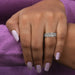 In finger look of exquisite crown style pave set wedding band with cluster of round cut lab diamonds