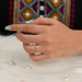 [A Women wearing Round Cut Half Eternity Band]-[Ouros Jewels]