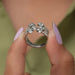 Close up look of  row pear shaped eco friendly lab diamond engagement ring
