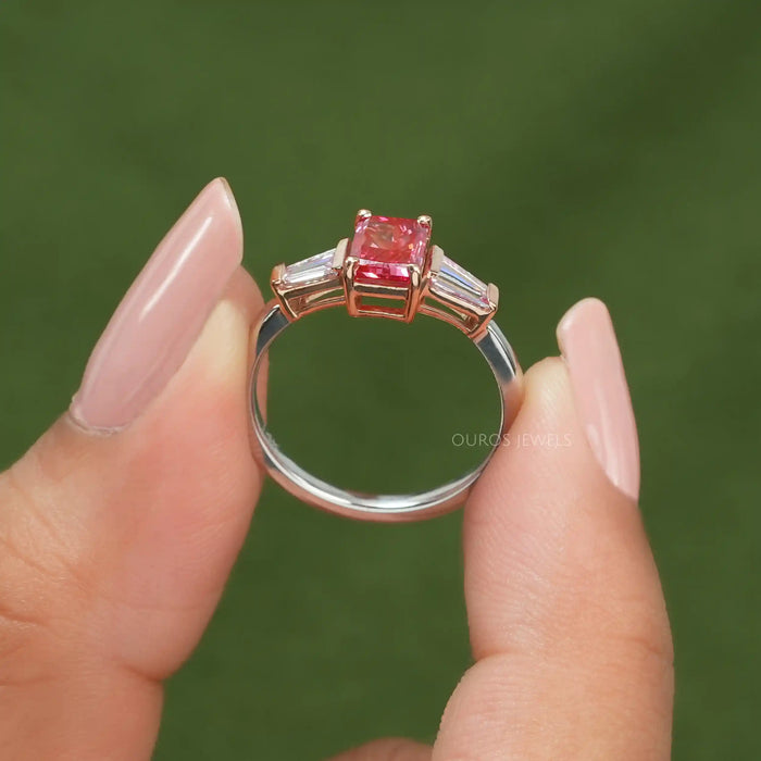 Fancy pink radiant cut lab made diamond engagement ring with 2 tapered baguette cut side stones