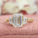 Three stone emerald cut lab grown diamond engagement ring with 2 antique trapezoid cut side stones 