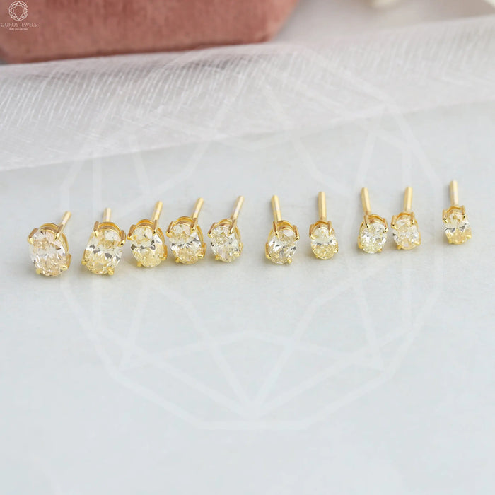 14k yellow gold eco-friendly diamond solitaire studs with screw back setting in solid gold