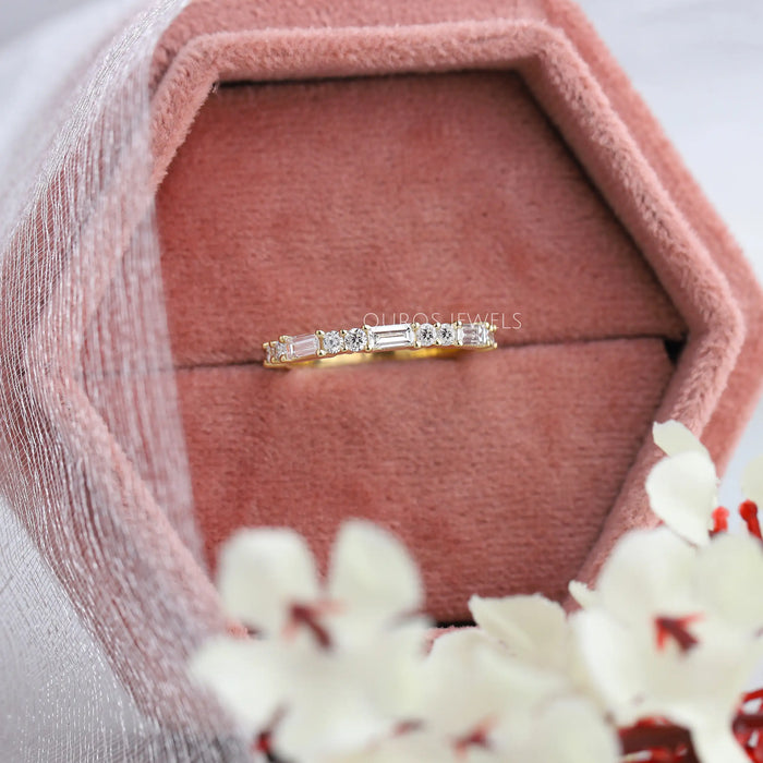 Baguette and round diamond half eternity wedding band in solid yellow gold
