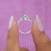 Shining lab made diamond engagement ring crafted with pear shaped lab made diamonds and solid white gold at Ouros Jewels