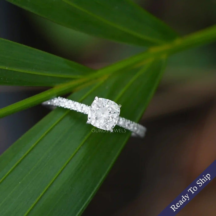 [Cushion-cut accent diamond ring on top of a leaf]-[Ouros Jewels]