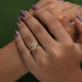 [A Women wearing Emerald Cut Bezel Set Engagement Ring]-[Ouros Jewels]