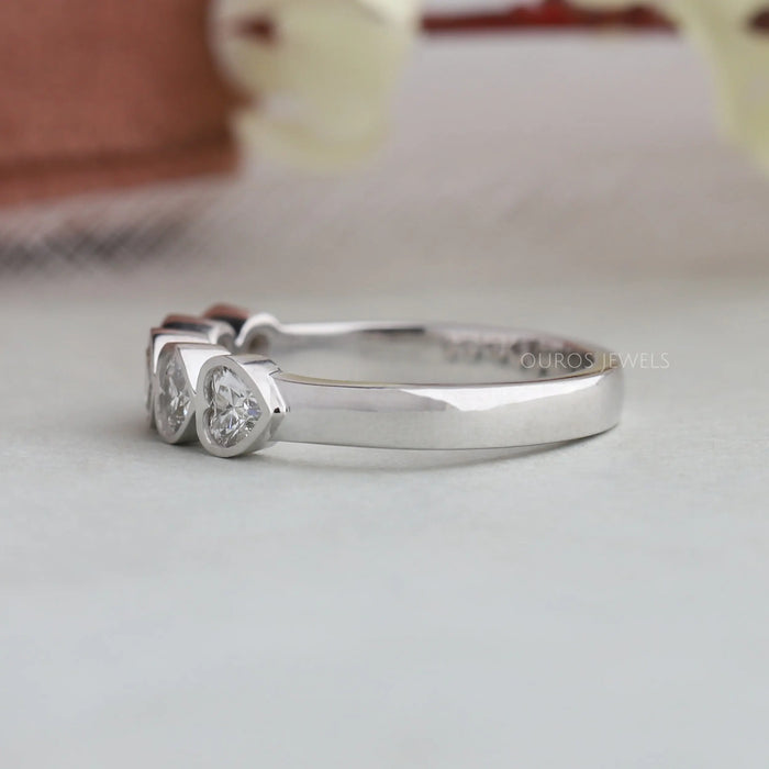 Stunning five stone heart cut lab diamond band is the perfect way to show your love crafted with five lab-created diamonds, this beautiful band is sure to make a statement.