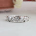 Five stone heart shape diamond wedding band with a bezel setting in solid white gold