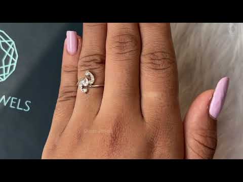 Youtube video of pear cut cluster diamond dainty ring