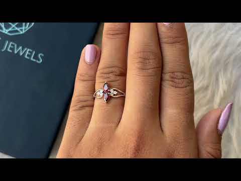 Youtube video of red pear lab diamond cluster dainty ring