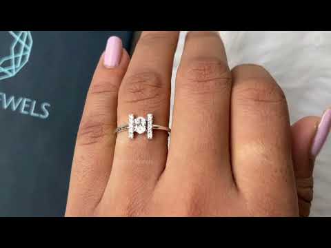 YouTube video of oval cut diamond engagement ring.