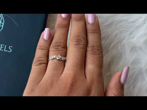 Youtube video of Olive Emerald Cut Bypass Ring With Round Accent Stones