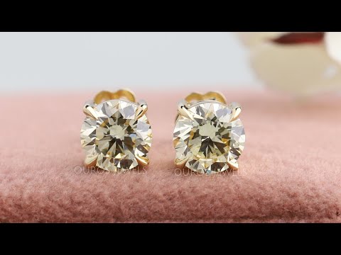 YouTube video of yellow round solitaire stud earrings