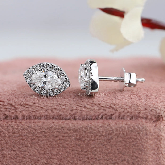 Eye shaped marquise cut diamond stud earrings with screw back setting in 14k white gold
